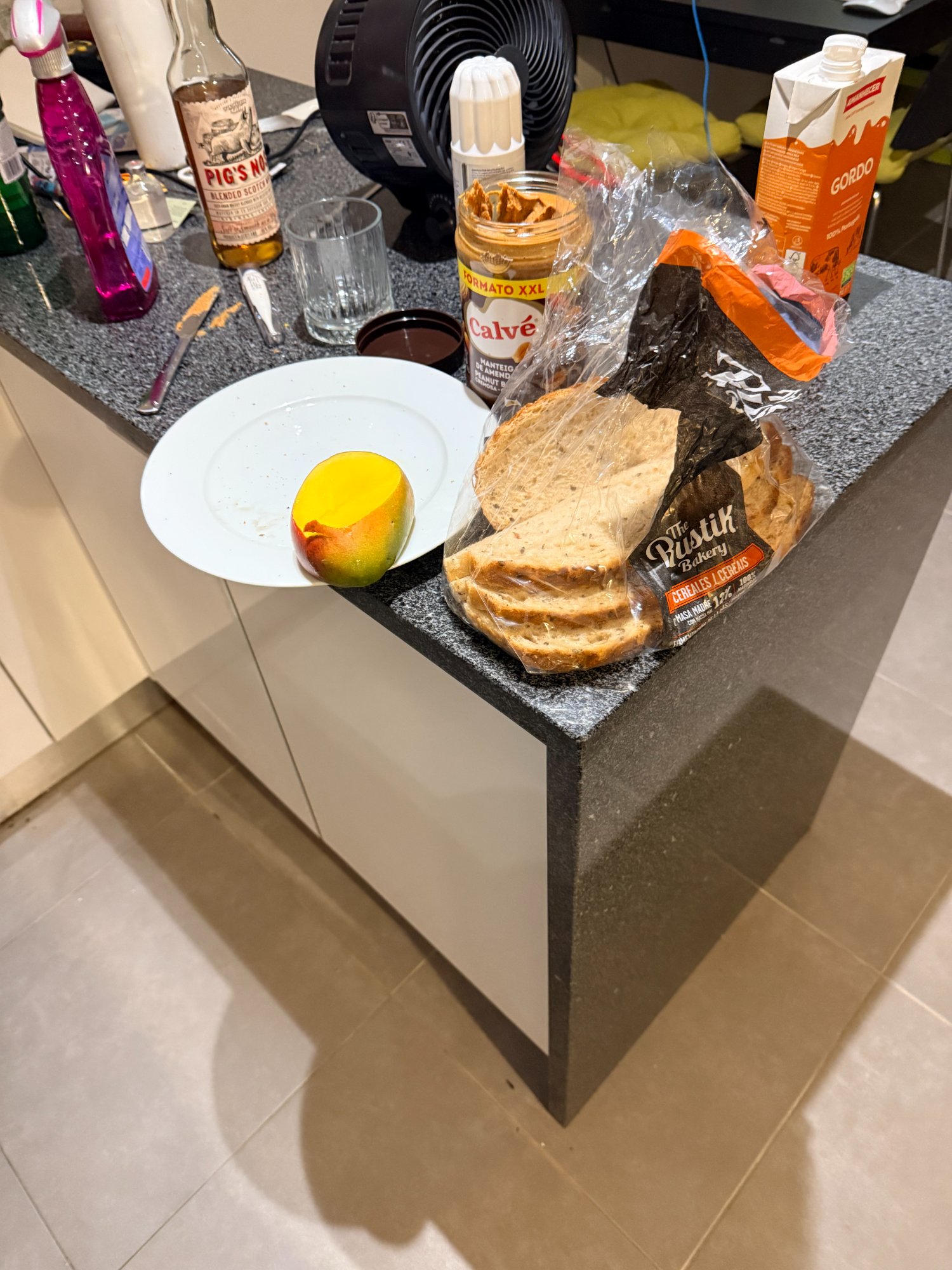 Bread, peanut butter, mango, Pig's Nose scotch — the sandwich